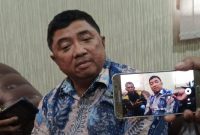 KETERANGAN.Ketua KONI Garut Ketua KONI Kabupaten Garut Dr. Ir. H. Abdusy Syakur Amin , M.Eng saat diwawancarai wartawan di Kampus Universitas Garut, jalan Raya Samarang kecamatan Tarogong Kidul, Senin (21/11/2022).