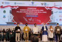 HADIRI. Pemimpin PNM Cabang Garut Abu Hassan saat menghadiri program Pemberian Nomor Induk Berusaha (NIB) Pelaku Usaha Mikro Dan Kecil (UMK) Perseorangan, di Gedung Intan Balarea, Jalan Patriot No.12-14, Kelurahan Sukagalih, Kecamatan Tarogong Kidul, Kamis (3/11/2022).