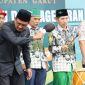 Wakil Bupati (Wabup) Garut, dr. Helmi Budiman, membuka secara resmi Expo  UMKM dalam rangka Harlah 1 Abad Nahdlatul Ulama Tingkat Kabupaten Garut,  di Alun-Alun Garut, Kecamatan Garut Kota, Kabupaten Garut, Kamis (9/2/2023). (Foto: Anggana Mulia/ Muhamad Azi/ Yogi Budiman/ Diskominfo Garut)