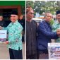 Kepala  Kantor Kementerian Agama Kabupaten Garut Dr H Saepulloh S Ag.M PdI,  menyerahkan Donasi Infak Kemanusiaan Palestina Kepada Baznas Kabupaten Garut dan diterima oleh Cecep Rukma, S.Sos., M.Si. Wakil Ketua 1 Bidang Pengumpulan BAZNAS Kabupaten Garut.dalam Upacara Peringatan Hari Guru Nasional di Halaman Kantor Kemenag Garut pada Sabtu, 25 November 2023.