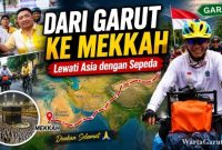 Bupati Garut Abdusy Syakur Amin melepas keberangkatan Asep Akung yang memulai perjalanan bersepeda menuju Mekkah melalui jalur Asia dari Pendopo Kabupaten Garut, Minggu (14/6/2026).