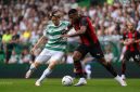 Duel pemain Celtic dan AC Milan pada laga pramusim.