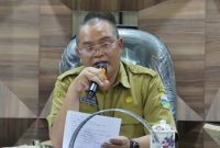 Kepala Disperkim Kabupaten Garut, Rika Agustiana, membahas perubahan Perbup PSU Perumahan Garut untuk memperkuat pengelolaan PSU, perlindungan penghuni, dan kepastian hukum bagi kawasan perumahan. Foto: Diskominfo Garut.