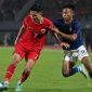 lustrasi pertandingan Indonesia melawan Kamboja.