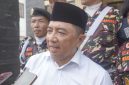 Bupati Garut Abdusy Syakur Amin memberikan keterangan terkait jalan Banjarwangi seusai menghadiri Pelantikan PC Muslimat NU Kabupaten Garut di Gedung Islamic Centre, Garut Kota, Sabtu (15/8/2026).
