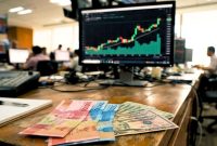 Ilustrasi pergerakan nilai tukar rupiah terhadap dolar AS.