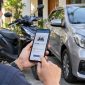pengecekan pajak kendaraan bermotor secara online melalui smartphone.(Ilustrasi )