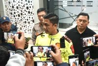 Kapolres Garut AKBP Niko N. Adi Putra menyampaikan keterangan terkait penangkapan tersangka dugaan penembakan seorang pelajar menggunakan airgun di Kecamatan Sukawening, Kabupaten Garut. Minggu (11/10/2026). Foto: Dokumentasi Polres Garut.