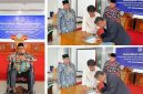 Ketua PDM Garut Dr. Agus Rahmat Nugraha menyampaikan amanah dalam pelantikan Iwan Jalaludin sebagai Kepala SMP Muhammadiyah Garut di Gedung Dakwah Muhammadiyah Garut, Jumat (23/10/2026).